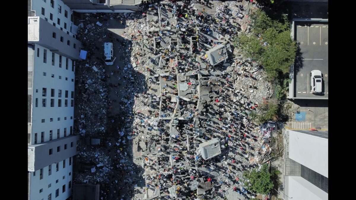Colombia Quake Levels Buildings, Sparks Survivor Search