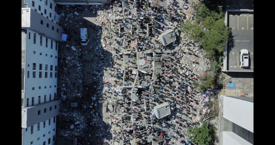 Colombia Quake Levels Buildings, Sparks Survivor Search
