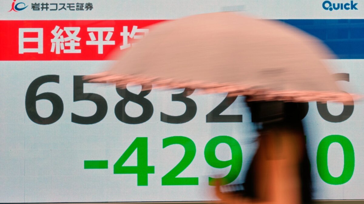 Asian stocks are mixed after Wall Street retreats following economic updates