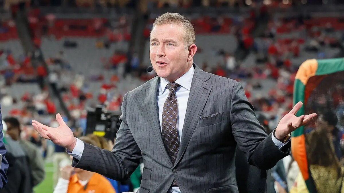 Kirk Herbstreit and his former gymnast wife have four boys thanks to handstands on the bed