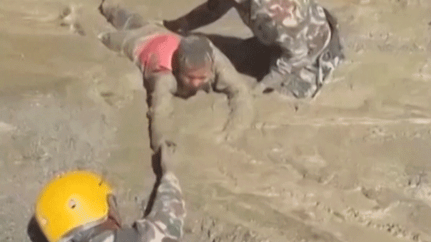 Nepal mudslide rescue video shows workers pulling people from tunnel