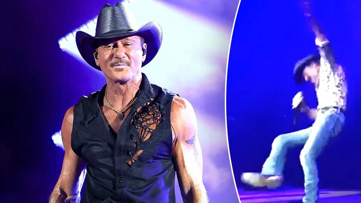 Tim McGraw falls on stage at Riverbend Music Center in Cincinnati