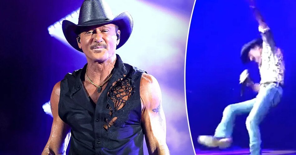 Tim McGraw falls on stage at Riverbend Music Center in Cincinnati